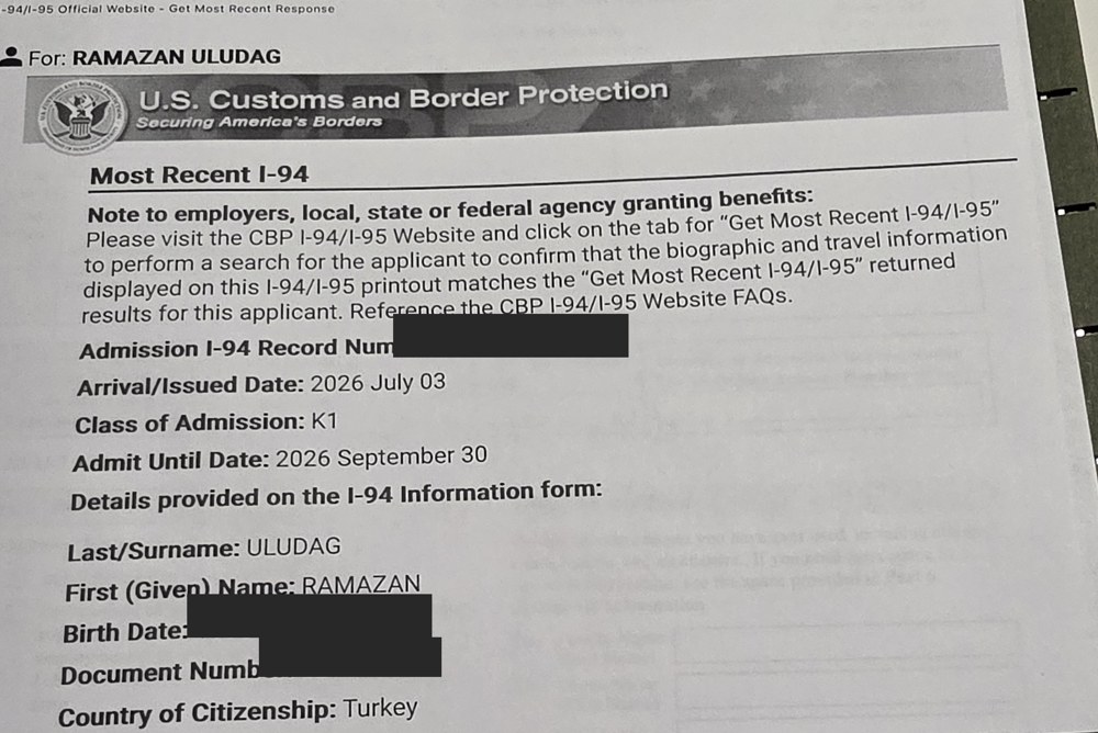 My real I-94 record from the CBP website: arrival 2026 July 03, class of admission K1. I covered the record number, my birth date and my passport number.